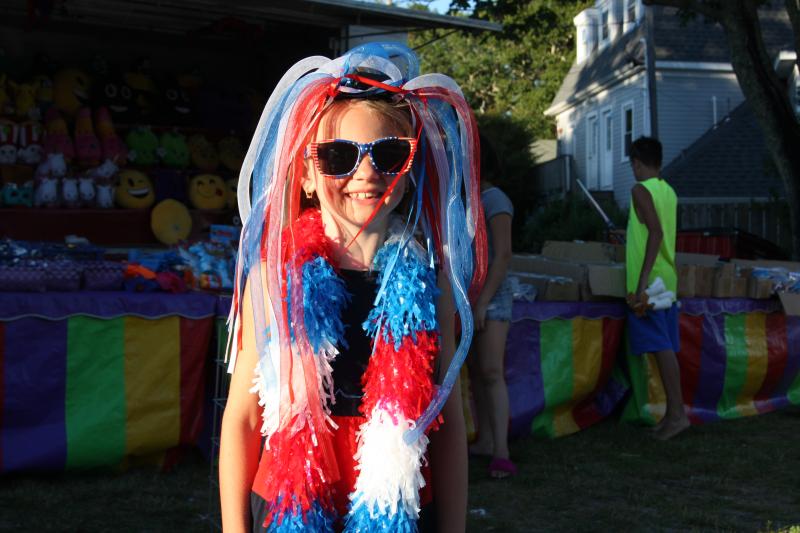 Lili Moretti, 7, of Carver is decked out in red, white and blue for the Onset Fireworks. BY MEGHAN NEELY